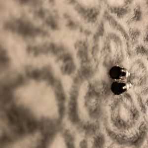 i’m selling earrings and they’re black